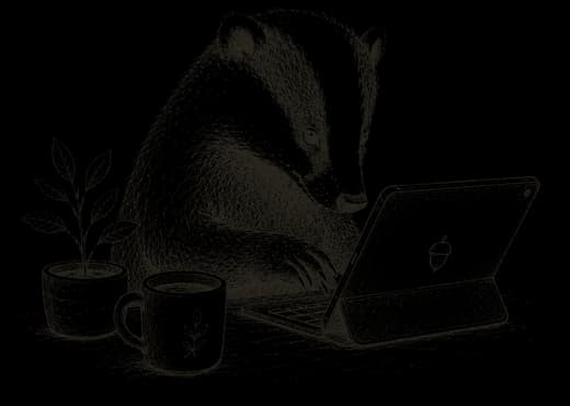 Sketched badger working at a laptop with a cup of tea